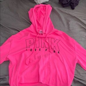 Victoria’s Secret pink cropped sweater.